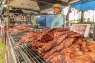 A food stall selling grilled meat in the night market in Kamala in Phuket, Thailand, Southeast Asia, Asia.
