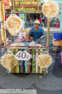 Thai chapatis being made at the famous Walking Street night market in Phuket old Town, Phuket, Thailand, Southeast Asia, Asia.