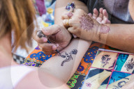 A henna tattoo being applied at the famous Walking Street night market in Phuket old Town, Phuket, Thailand,Southeast Asia, Asia