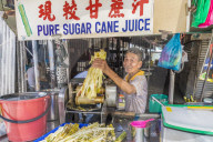 A pure sugar cane juice stall in George Town ,Penang Island, Malaysia, Southeast Asia, Asia.