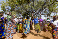 Members of a women's microfinance cooperative welcoming a visitor with dances in Northern Togo.