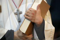 Saint-Jacques church. Altar boy with lectionary. Sallanches. France.