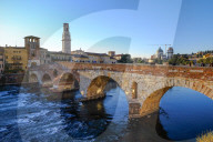 The Ponte Pietra, a Roman arch bridge crossing the Adige River in Verona, Italy, Europe