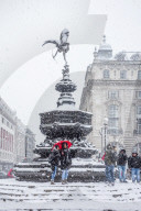 UK, England, London, The West End, Piccadilly Circus, Eros Statue, snow storm