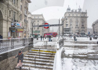 UK, England, London, The West End, Piccadilly Circus, Underground Station entrance, snow storm