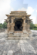 The Sas-Bahu Temples near Udaipur, India consist of two temples and a stone archway. Exquisite carvings depict Hindu dieties.