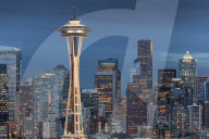 Seattle city skyline at night with illuminated office buildings and Space Needle viewed from public garden near Kerry Park. Seattle, Washington, USA North America