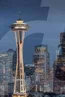 Seattle city skyline at night with illuminated office buildings and Space Needle viewed from public garden near Kerry Park. Seattle, Washington, USA North America