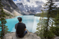Lone traveller at Moraine Lake and the Valley of the Ten Peaks, Rockies, Banff National Park, UNESCO World Heritage Site, Alberta, Canada, North America