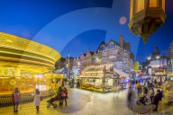 Christmas Market, Carousel and lamp on Old Market Square at dusk, Nottingham, Nottinghamshire, England, United Kingdom, Europe