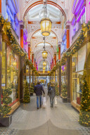 Christmas decorations and shoppers in The Royal Arcade,Mayfair, London, England, UK, Europe