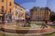 View of fountain and pastel coloured architecture in Piazza Garibaldi, Riva del Garda, Lake Garda, Trentino, Italy, Europe