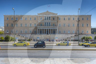Parliament building and yellow cabs in Syntagma Square, Athens, Greece, Europe