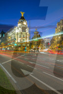 View of trail lights on Calle de Alcala and the entry to Gran Via at dusk, Madrid, Spain, Europe