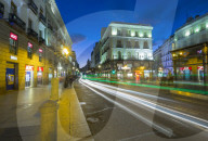 Trail lights and Architecture at Puerta del Sol at dusk, Madrid, Spain, Europe