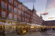 View of restaurants in Plaza Mayor at dusk, Madrid, Spain, Europe