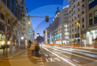 View of architecture and trail lights on Gran Via at dusk, Madrid, Spain, Europe
