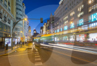 View of architecture and trail lights on Gran Via at dusk, Madrid, Spain, Europe