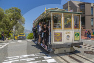 View of Hyde Street cable car and Alcatraz in backgound, San Francisco, California, USA, North America