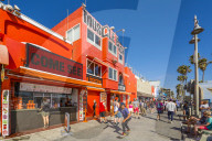 View of colourful shops on Ocean Front Walk in Venice Beach, Los Angeles, California, United States of America, North America