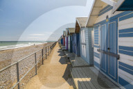 View of colourful beach huts on a summer day, Cromer, Norfolk, England, United Kingdom, Europe
