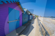 View of colourful beach huts on a summer day, Cromer, Norfolk, England, United Kingdom, Europe
