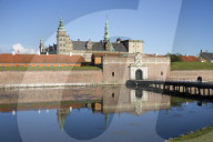 View over moat to entrance gate of Kronborg Castle used as setting for Shakespeare's Hamlet, Helsingor, Zealand, Denmark, Europe
