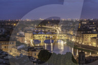 The river Arno and Ponte Vecchio at dusk.