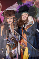 Japanese men dressed as Captain Jack Sparrow and Captain Barbossa from the Pirates of the Caribbean on Halloween in Shibuya