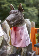 Stone foxes at Fushimi Inari shrine in Kyoto.