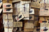 Votives, or Ema prayer tablets, with prayers & wishes for success at Kitano Tenmangu Temple.