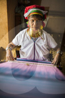 Lock neck woman from Palaung tribe weaving at Inle Lake, Shan State, Myanmar (Burma)