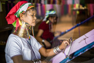 Lock neck woman from Palaung tribe weaving at Inle Lake, Shan State, Myanmar (Burma)