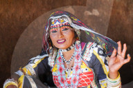 Portrait, Kalbelia gypsy dancer in traditional dress, Thar Desert, Osian.