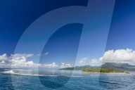 On approach to Ra'iÄtea through a break in the atoll reef, Society Islands, French Polynesia.