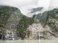 Ice melt waterfall in Tracy Arm-Fords Terror Wilderness Area, Southeast Alaska, USA.