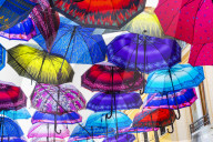 Colorful umbrellas hanging in a street, Skopje, Macedonia