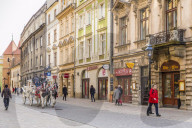 A horse drawn carriage in the medieval old town, a UNESCO World Heritage site, in Krakow, Poland, Europe.