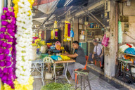 Colourful traditional garland maker in George Town, a UNESCO World Heritage site, Penang Island, Malaysia, Southeast Asia, Asia.