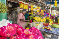 Colourful traditional garland maker in George Town, a UNESCO World Heritage site, Penang Island, Malaysia, Southeast Asia, Asia.