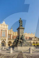 The Adam Mickiewicz Monument in the main Square in the medieval old town, a UNESCO World site, in Krakow, Poland, Europe