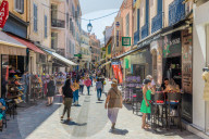 A street scene in Le Suquet old town in Cannes, Alpes Maritimes, Cote d'Azur, French Riviera, France, Mediterranean, Europe
