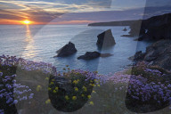 Sunset over Bedruthan Steps, Carnewas, Cornwall, England, United Kingdom, Europe.