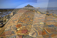 The cobbled causeway leading to St Michael's Mount at Marazion, Cornwall, England, United Kingdom, Europe.