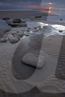 Tidal pools at sunset at Dunraven Bay, Southerndown, Glamorgan Heritage Coast, Wales, U.K.