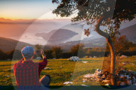 Photographing the Iseo lake and Monte Isola at sunset in autumn season, Lombardy district, Brescia province, Italy, Europe