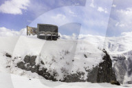 The Russia-Georgia Friendship monument at the end of the winter, covered in snow.