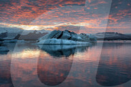 Incredible sunset in winter above Jokulsarlon Glacial Lagoon, Jokulsarlon, South Iceland.