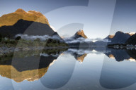Low cloud lying below Mitre Peak at Milford Sound, Fiordland National Park, New Zealand