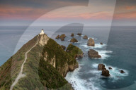 Nugget Point lighthouse at sunset, Kaka Point, Otago, South Island, New Zealand, Pacific